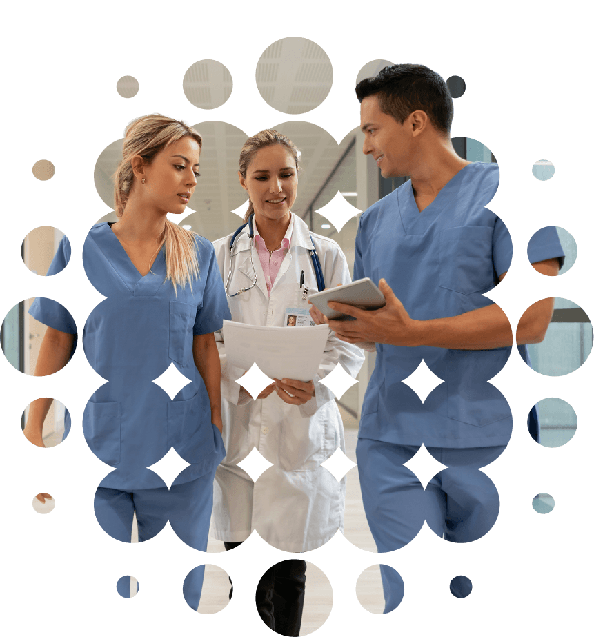 Photo of doctor and two nurses of doctors conversing