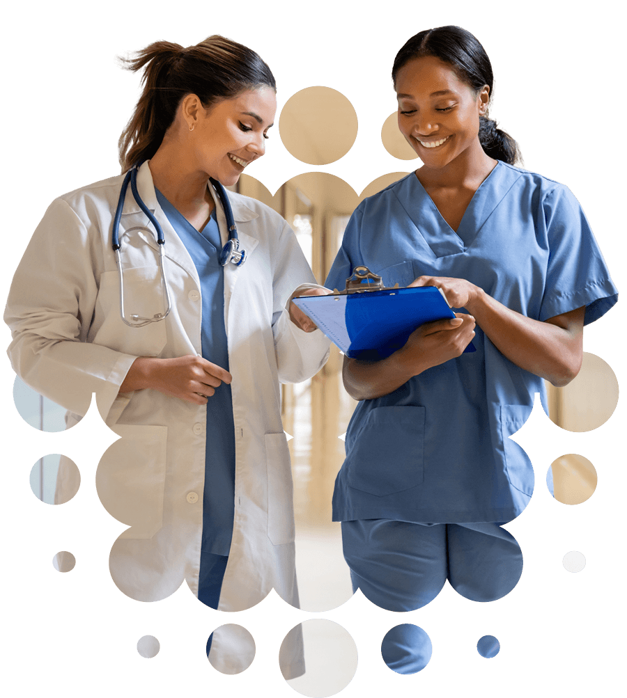 Photo of female doctor and nurse conversing