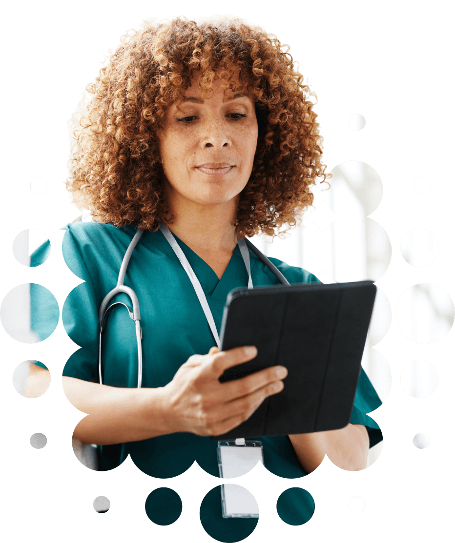 Photo of female doctor using tablet computer