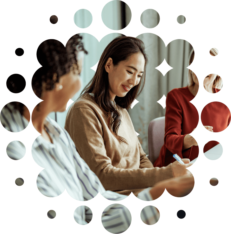 Photo of business women in meeting