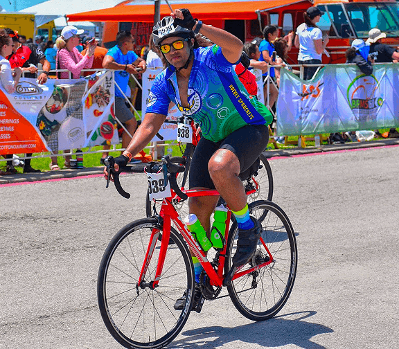 Employee participating in a cycling event.