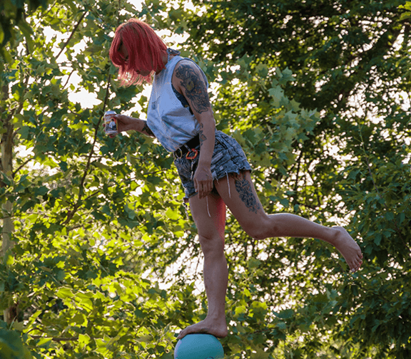 Employee participating in an outdoor team-building activity.